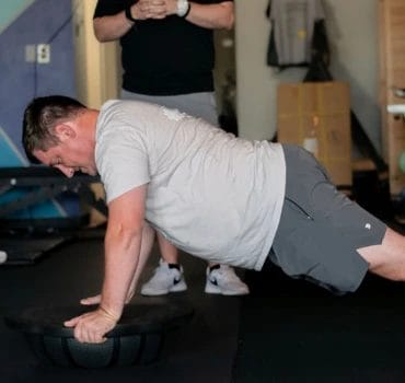 Man doing pushups in Evolve Personal Training